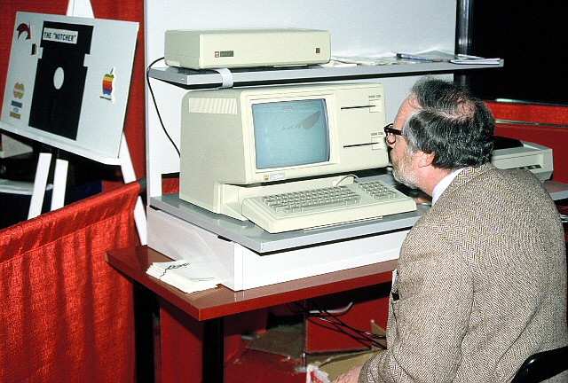 Close view of an Apple Lisa, showing the Twiggy floppy drive slots and front panel detailing.